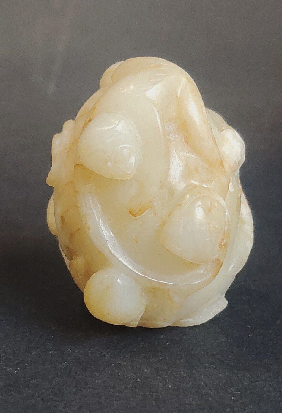 rare yellow jade snuff bottle carved from a monkey and peach of longevity China 18th century